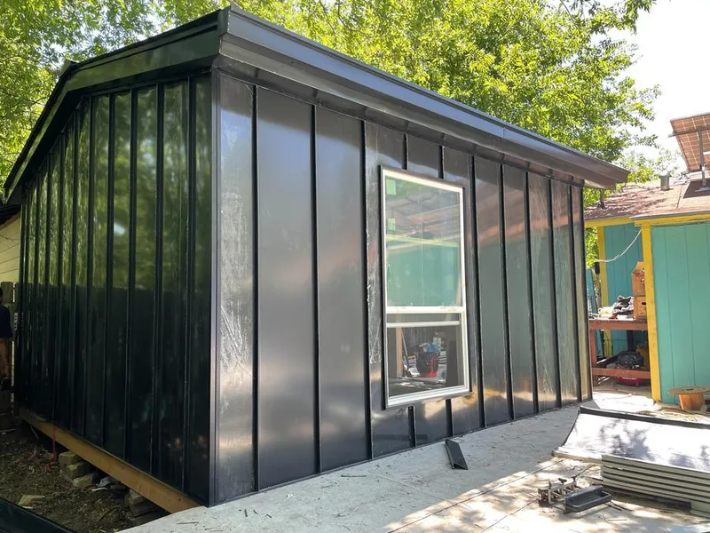 Black standing seam metal wall panels for Metal Roof Installation in Natick