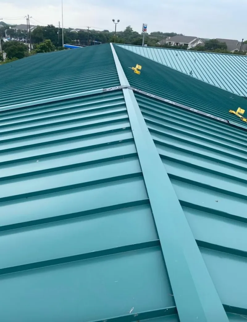 Green commercial metal roof ridge and valley for Metal Roof Repair in Natick
