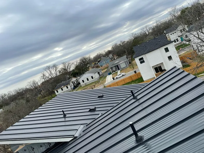 Standing seam metal roof panels with vents for Skylight Repair in Natick
